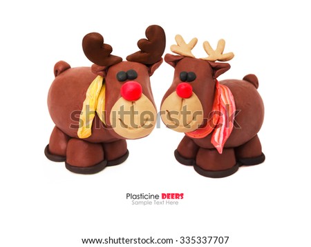 Couple of romantic christmas family cartoon plasticine deers on a white background