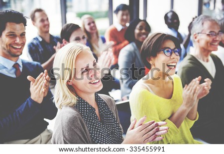 Group of Multiethnic Cheerful People Applauding Concept Royalty-Free Stock Photo #335455991