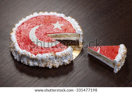 The symbol of war and separatism: a cake with a picture of the flag of Turkey is broken into pieces