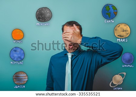 businessman put his hand over his eyes and opened his mouth surprised the planet of the solar system astronomy