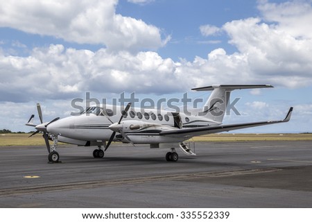 Twin engined turboprop aircraft Royalty-Free Stock Photo #335552339