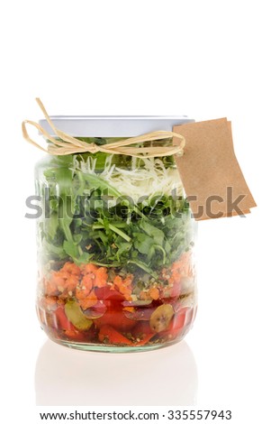 Salad in a jar isolated on white