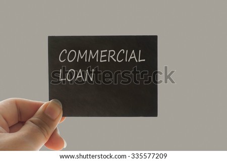 COMMERCIAL LOAN message on the card shown by a man, vintage tone