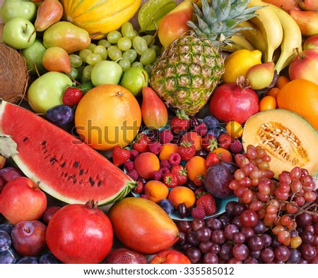 Healthy natural fruit background / food photography of the variety of fruits at the market. Copy spacy for your text. High resolution product
