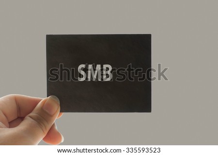 SMB  message on the card shown by a man, vintage tone