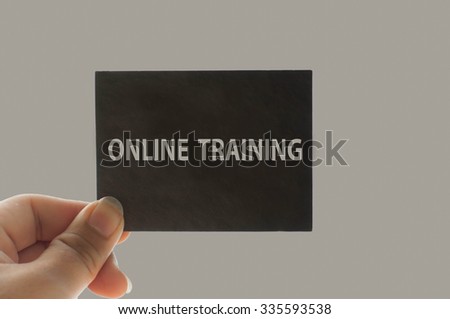 ONLINE TRAINING message on the card shown by a man, vintage tone