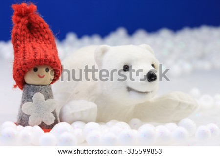 Beautiful winter scene with cute puppet and polar bear