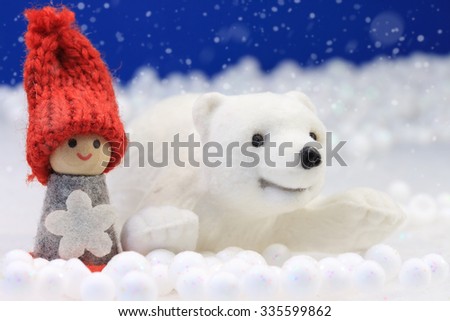 Beautiful winter scene with cute puppet and polar bear