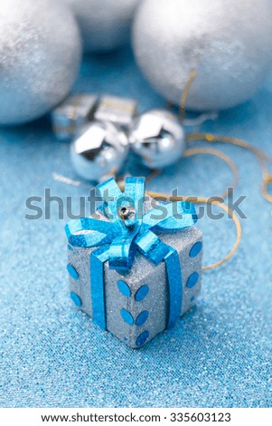 Merry Christmas and Happy New Year box gift with glitter background