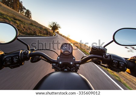 The view over the handlebars of motorcycle Royalty-Free Stock Photo #335609012