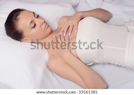 picture of happy lady relaxing in massage salon
