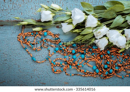 beads on a wooden background
