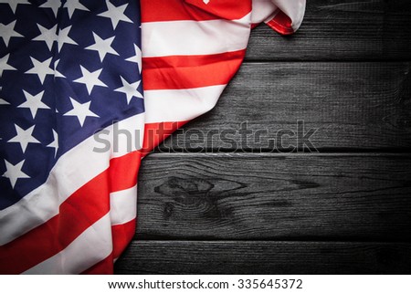 Flag of USA on dark wood background