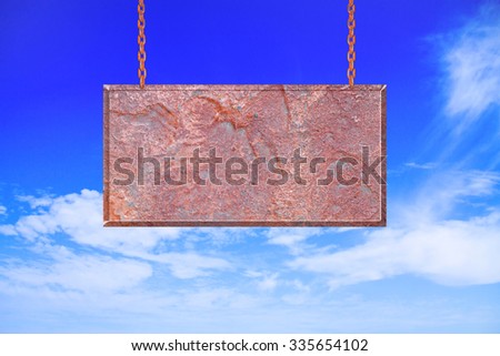Stone banners hanging on sky background