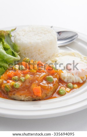 Rice with hamburg steak and fried egg, stock photo