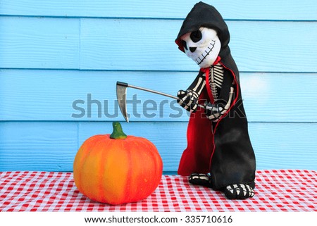 halloween doll on blue background