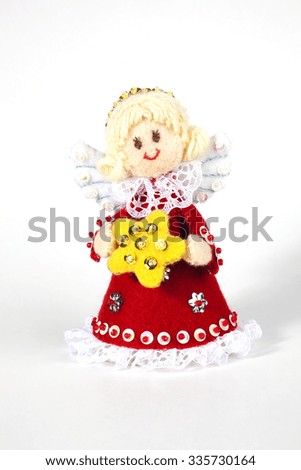 Red christmas angel isolated on a white background.