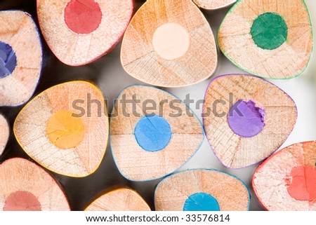 Many pencils of different colors on a over white background-Shallow DOF-