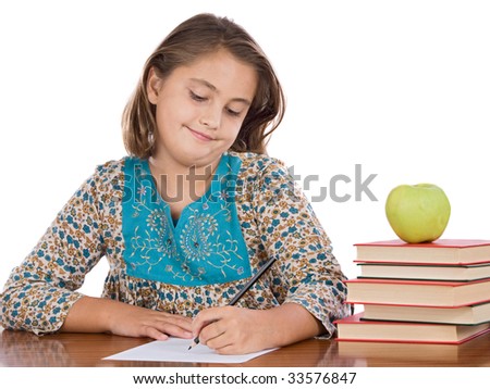 Adorable girl studying in the school a over white background