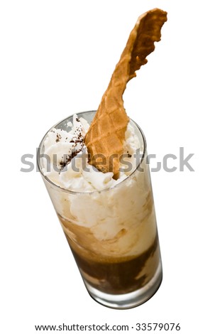Close up on a glass full of ice cream and whipped cream isolated on white. Freshness, relaxing, summer concept. Jpeg file with clipping path included.