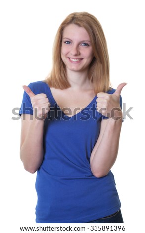 Young woman with red hair and crossed arms showing both thumbs