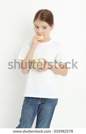 Beautiful kid holding french food