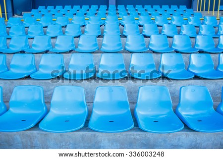 Front view of blue bench or chair in the stadium.