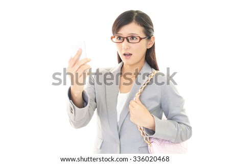 Surprised Asian business woman