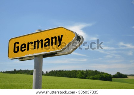 street sign to Germany