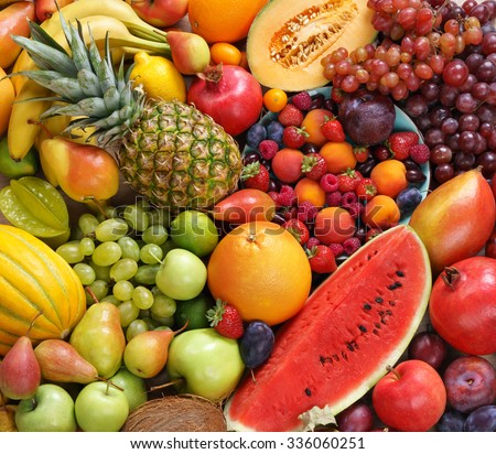 Superfood background. Only Fruit / food photography of ripe fruits at the market. Copy spacy for your text. High resolution product