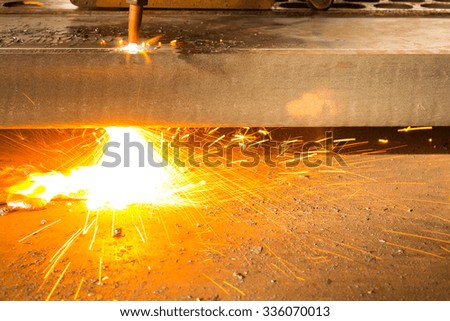 Sparkles, Fire gas cutting slab, Industry steel background.
