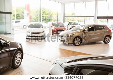 View of row new car at new car showroom Royalty-Free Stock Photo #336079028