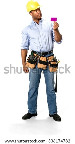 Serious Male Construction Worker with short black hair in uniform holding business card - Isolated