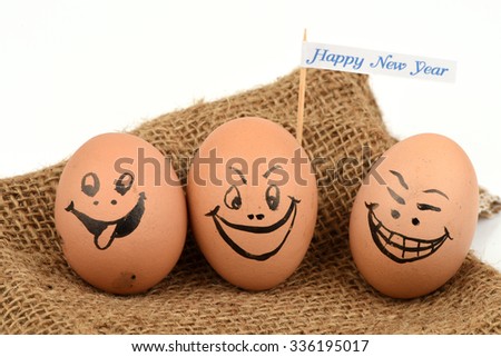Eggs with cartoon faces many emotions of happiness for the New Year 2016.