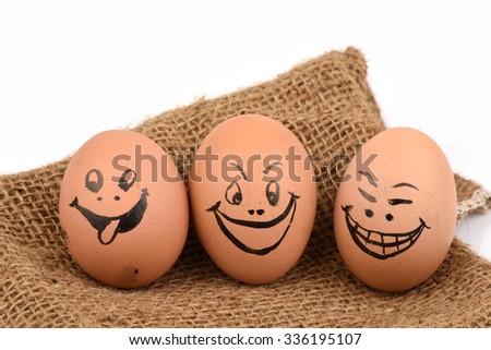 Egg with cartoon faces many emotions of happiness.