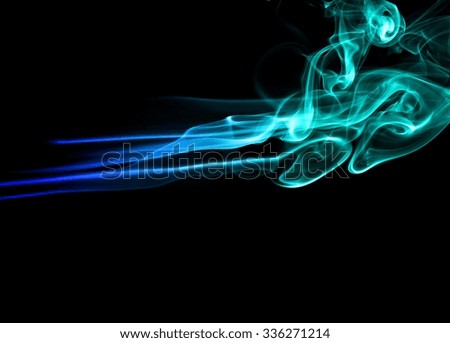 movement of smoke, Abstract Light blue smoke on black background, Light blue background,Light blue ink on black background