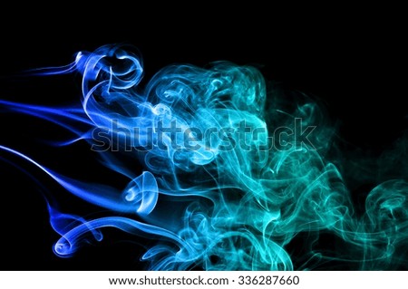 movement of smoke, Abstract Light blue smoke on black background, Light blue background,Light blue ink on black background