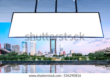 blank billboard on cityscape