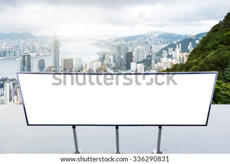 blank billboard on cityscape