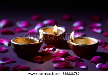 Traditional clay diya lamps lit during Diwali celebration