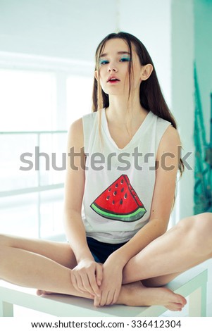 Girl in the top with watermelon