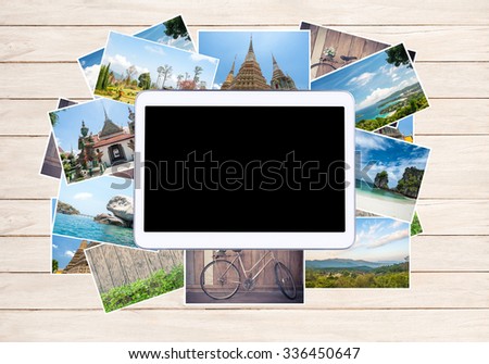 Tablet computer on Travel Pictures - can be used for display your products or promotional and advertising posters.