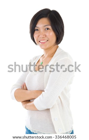 Asian mature woman smiling happy portrait. Beautiful mature middle aged Chinese Asian woman isolated on white background. Royalty-Free Stock Photo #336468005