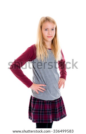 portrait of a nice blond girl in plaid skirt