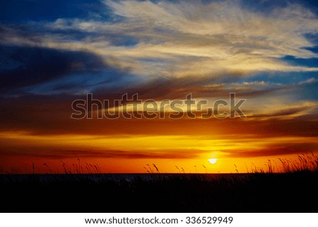 Sunset over the ocean. sunset at coast of the sea