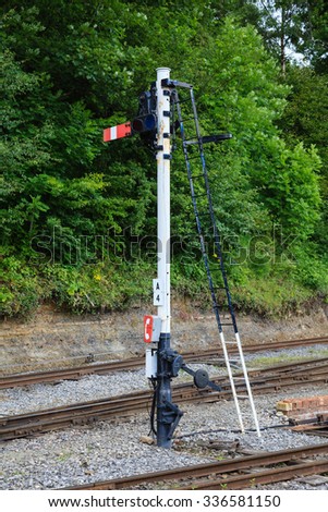 Railway Semaphore Signal.  An historic semaphore signal in the stop / danger position on the South Tynedale railway in Cumbria, North of England.