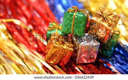 Christmas gift box on colourful background