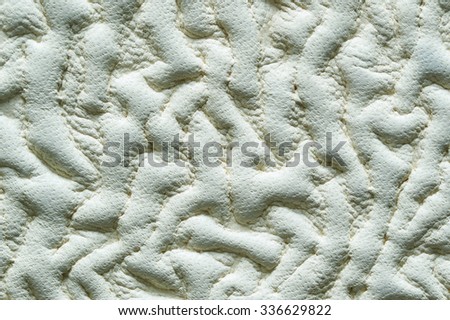 Closeup of seamless white leather texture for background