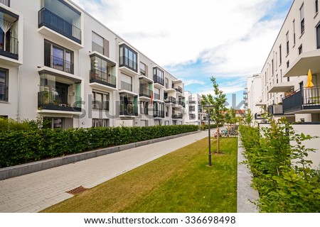 Modern residential buildings with outdoor facilities, Facade of new low-energy houses Royalty-Free Stock Photo #336698498