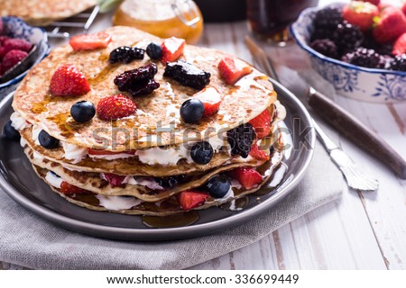 Shrove Tuesday, pancake day, with berry fruits Royalty-Free Stock Photo #336699449